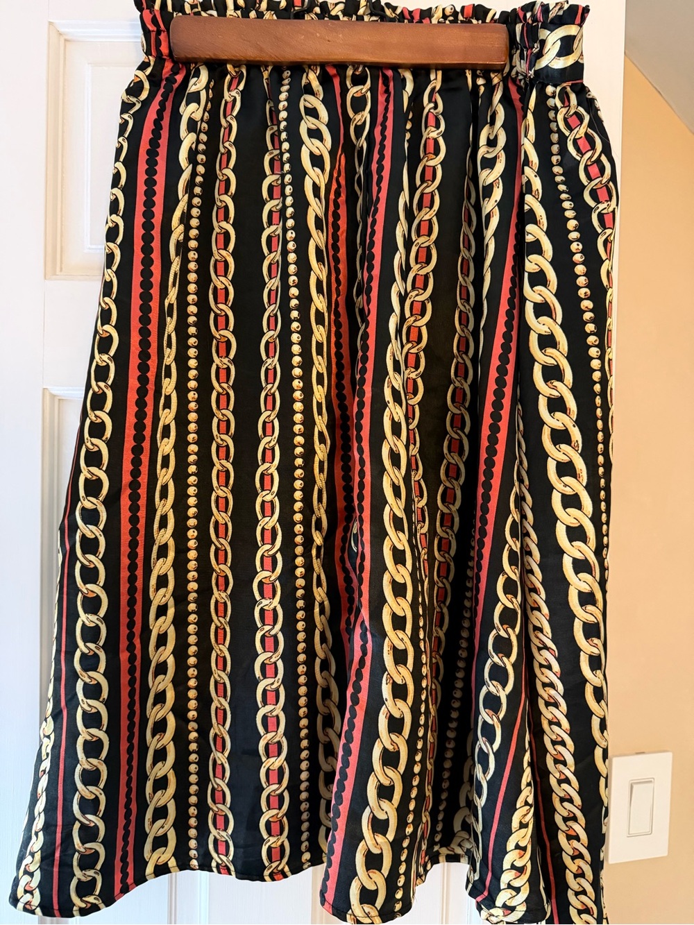 Black & Gold Chain-Print A-Line Skirt with Red Accents